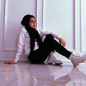 White furry inside white “timbs”